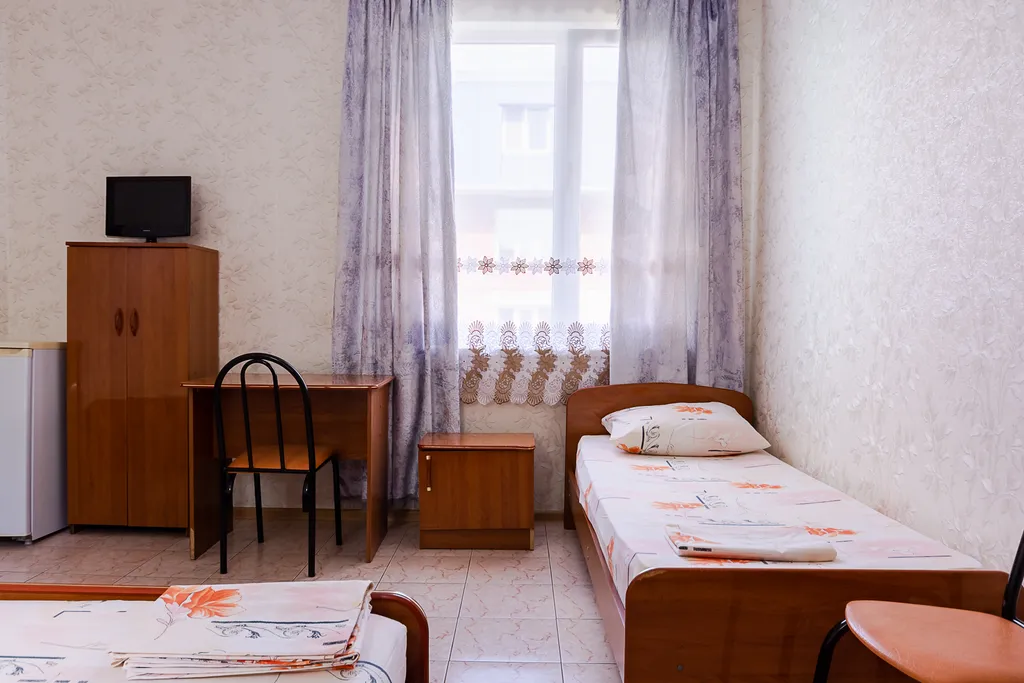 Четырёхместный номер с удобствами, парковка в подарок