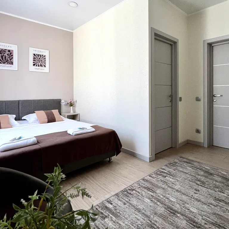 Квартира Квартира Уютный номер с 1 двуспальной или 2 раздельными кроватями — Сириус