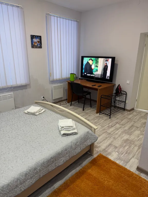 Комната с кухней-гостиной и сауной