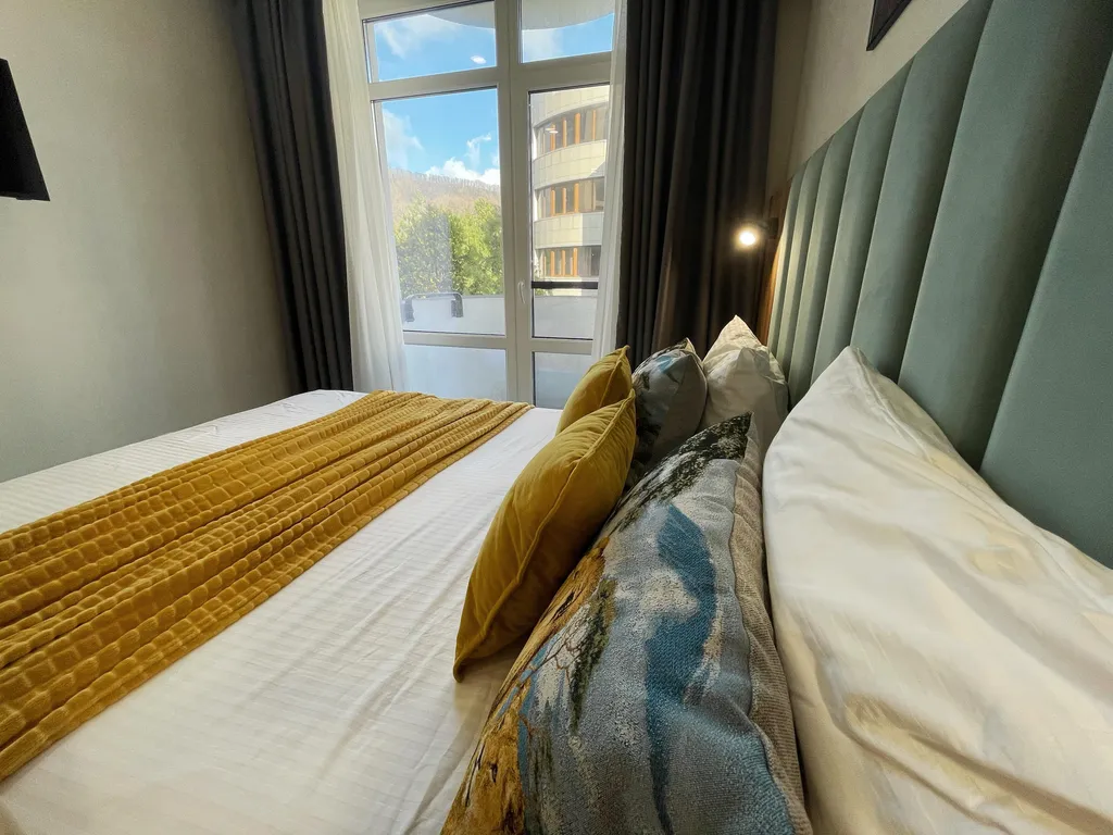 Апартамент в 3 минутах до моря с маленьким балконом и видом на горы