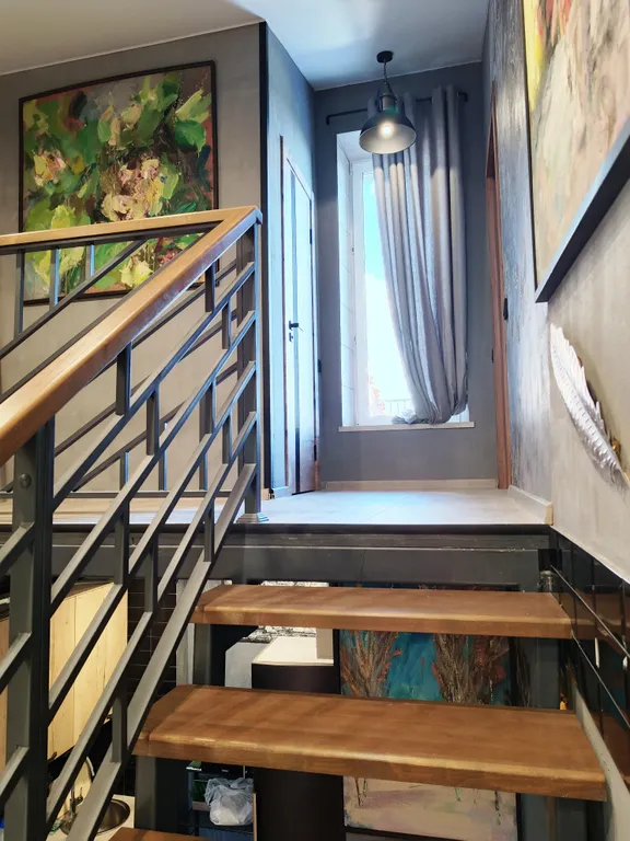 Атмосферная двухуровневая квартира с видом на Петропавловский парк