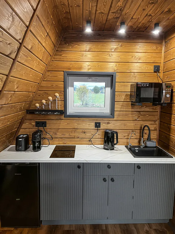 Дом Афрейм с подогреваемой купелью в террасе дома Лисичкино Карелия