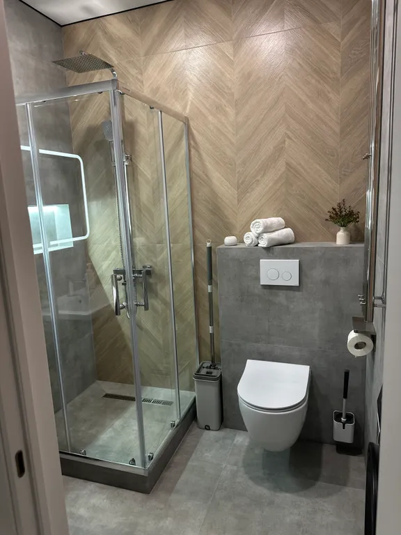 Уютная квартира в новом комплексе с дизайнерским ремонтом