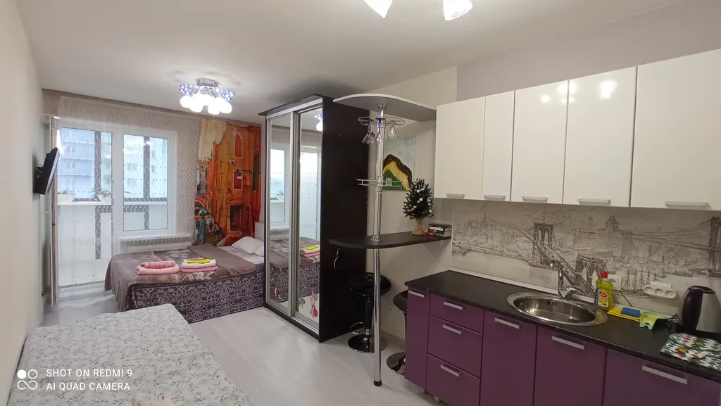 Уютная студия с видом на бульвар