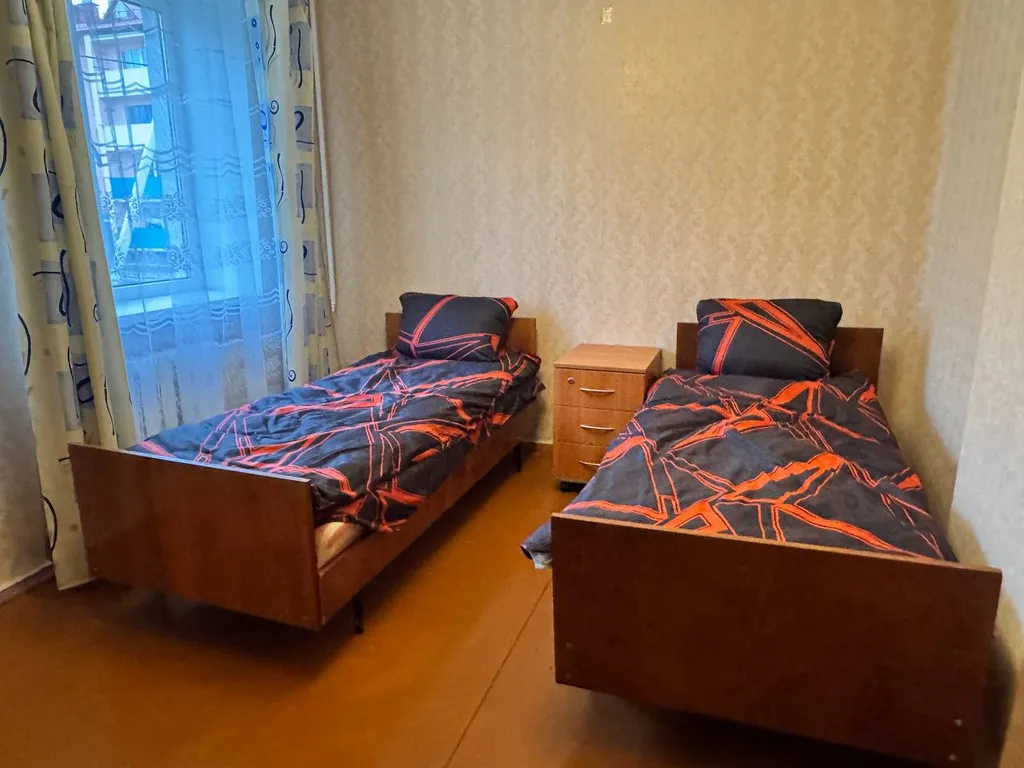 Трёхкомнатная двухуровневая квартира в центре города