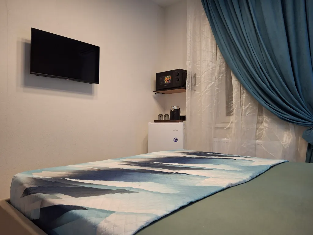 Семейный двухкомнатный люкс с балконом 15