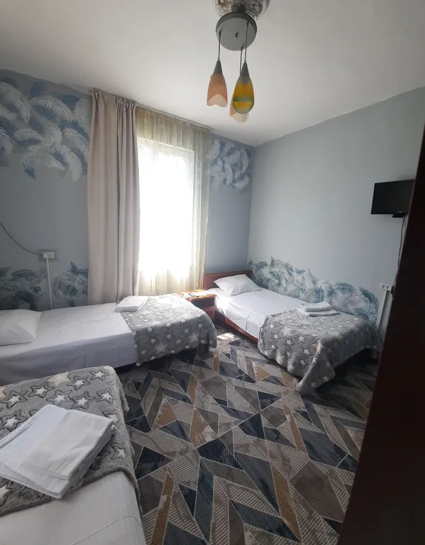 Трёхместный номер с тремя кроватями