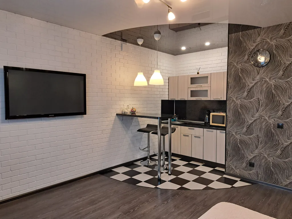 Студия с кондиционером на 14 этаже с видом на стадион