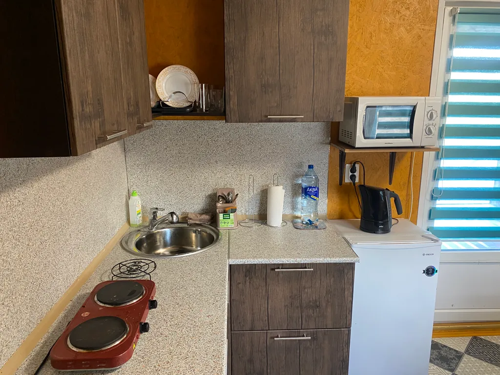 Дом с террасой на берегу реки Кобонка