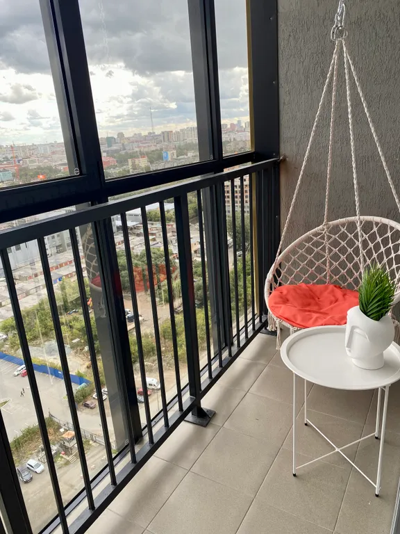 Большая студия в центре на 22 этаже с видом на реку и колесо обозрения