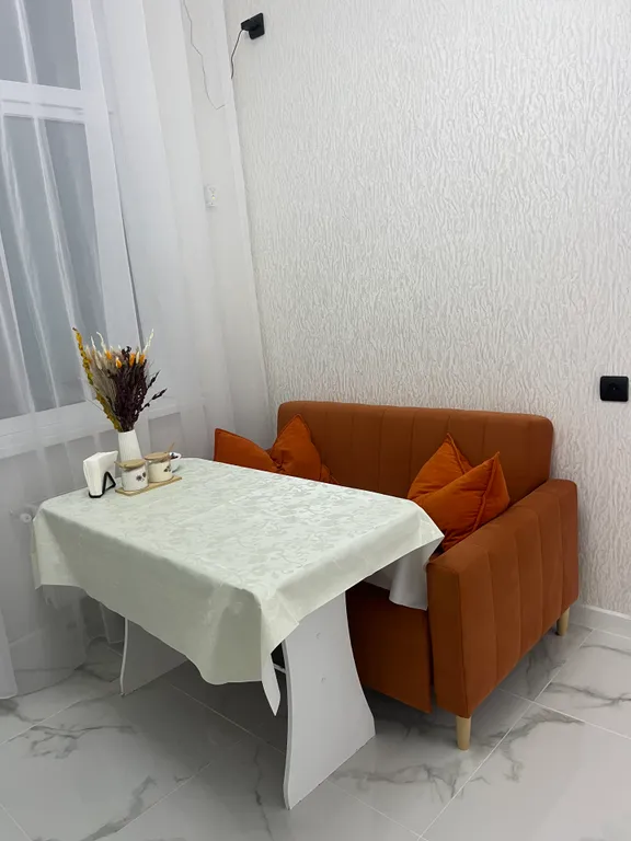 Светлая и уютная квартира с высокими потолками