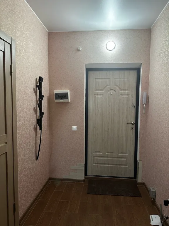 Квартира-студия с новой кроватью и кондиционером