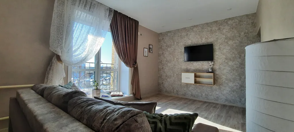 Солнечные апартаменты с видом на город