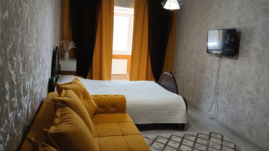 "Квартира в центре города с видом на горы"