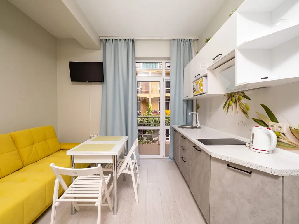 Квартира Квартира Солнечная студия у моря с теплым бассейном — Сириус