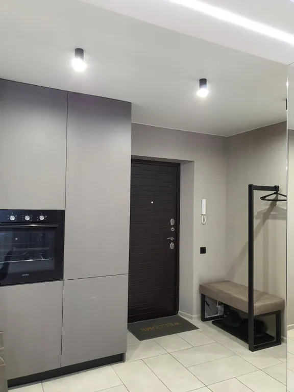 Новая квартира с гостиной и изолированной спальней в центре