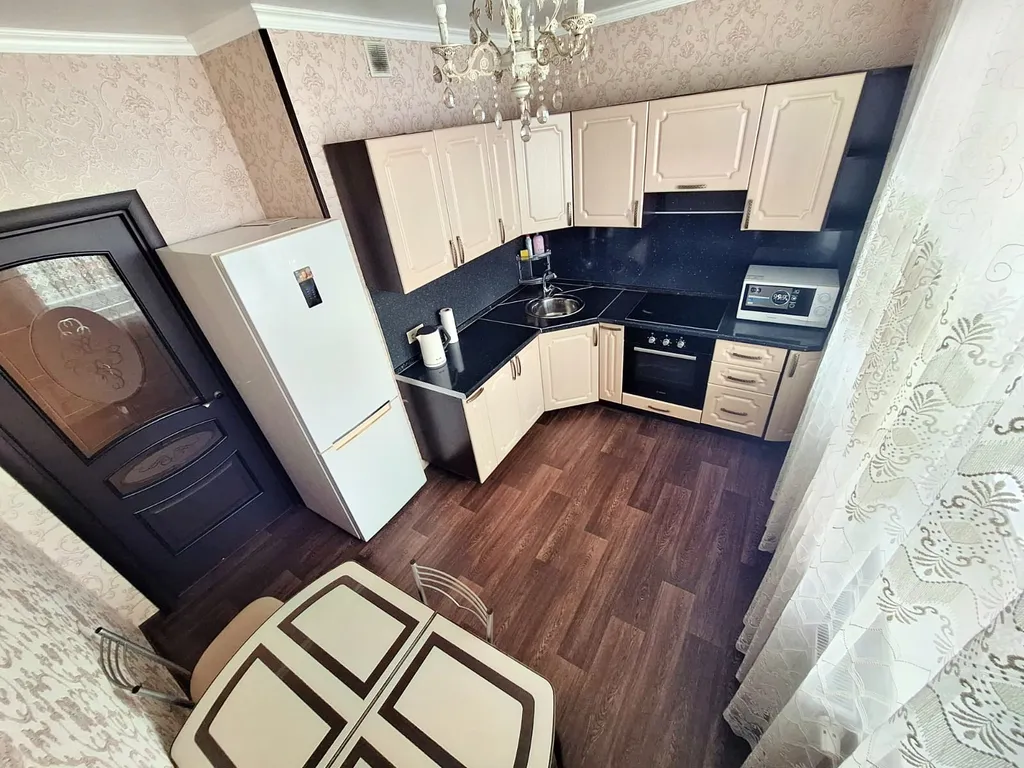 Квартира с двумя балконами на выезде