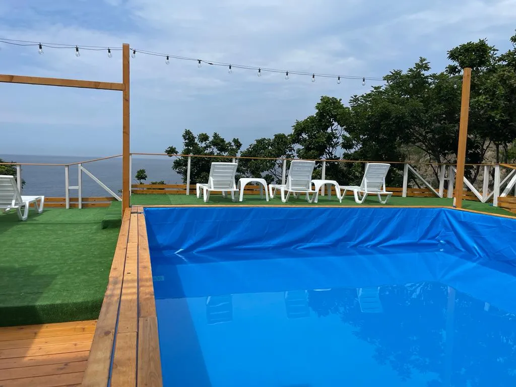 Апартаменты на 1 этаже с видом на море, выходом на бассейн