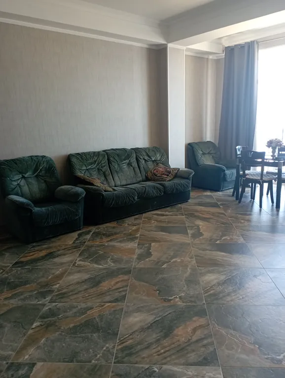 Уютная квартира-студия с панорамными окнами и видом на море