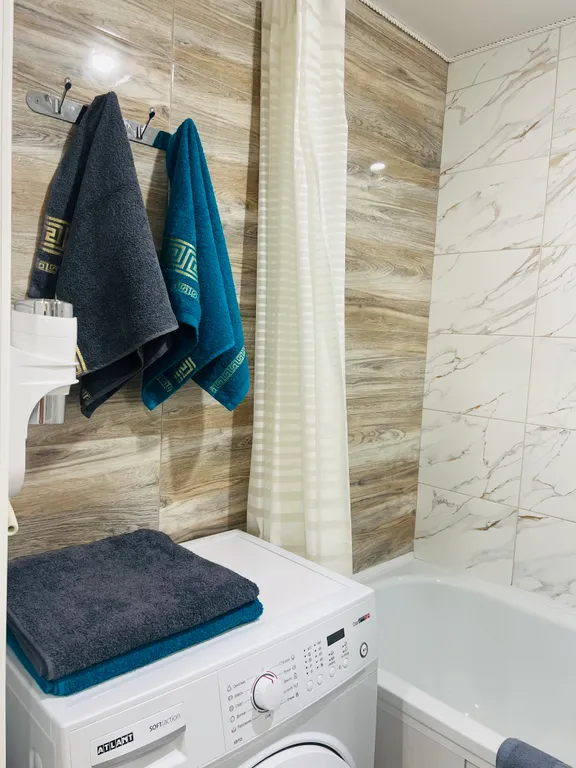 Уютные апартаменты на Шаландина