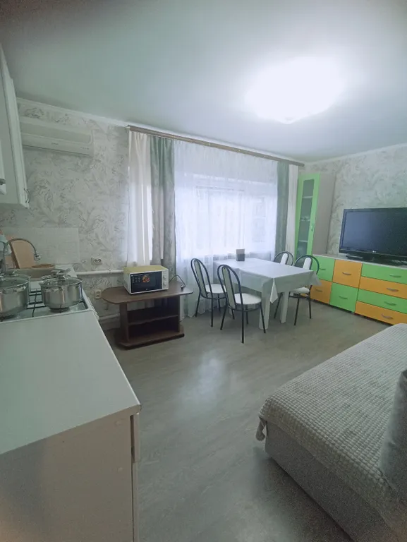 Квартира со своим двориком и стоянкой