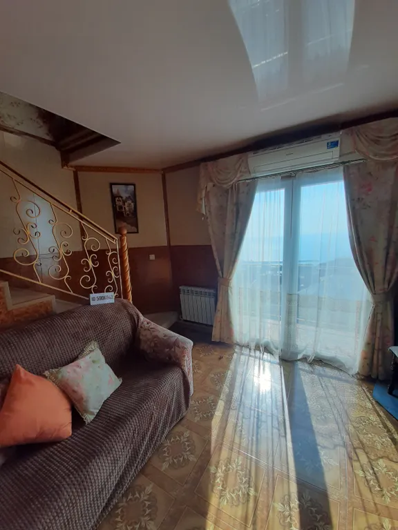 Дом с видом на море и город