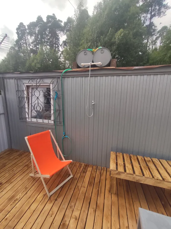 Домик с террасой в черте города