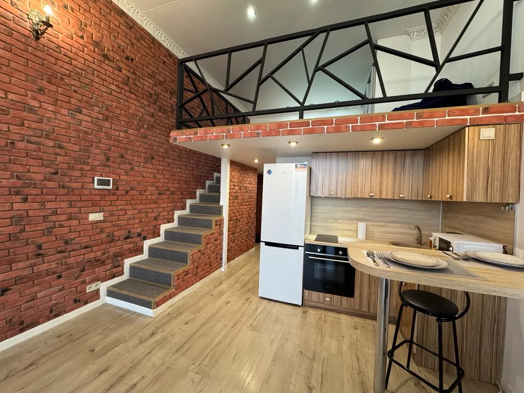 Двухуровневая стильная и комфортабельная квартира