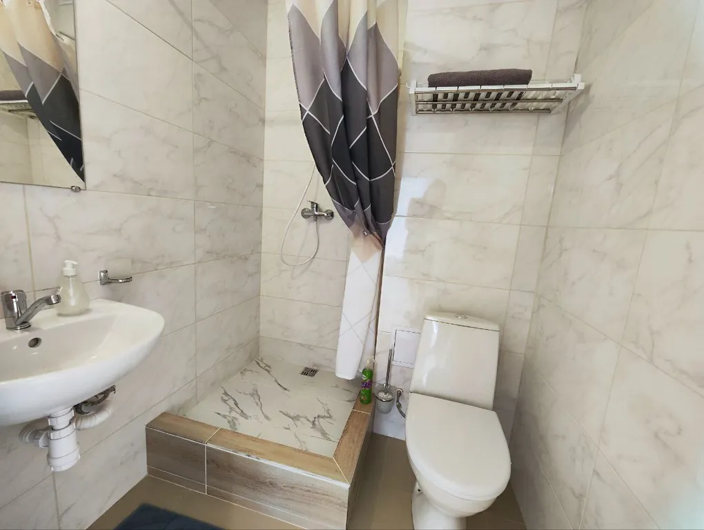 Семейный номер на мансарде в гостевом доме Регион 86