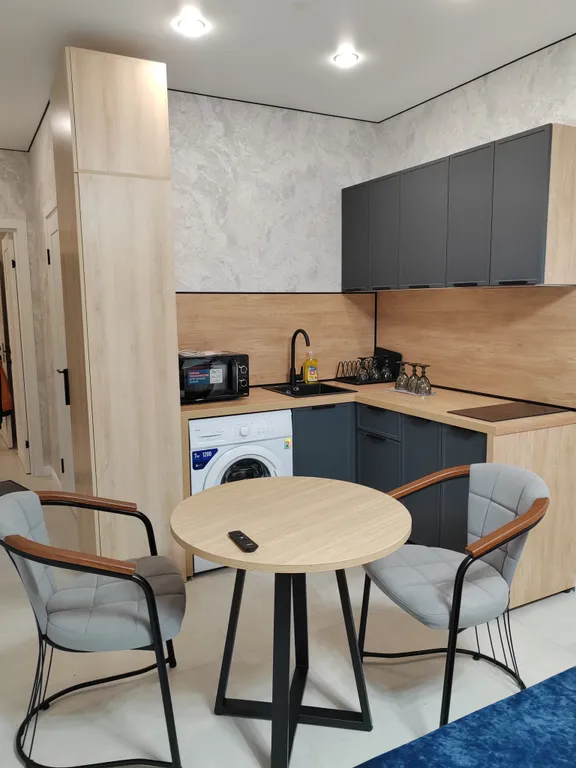 Уютная студия с панорамным окном