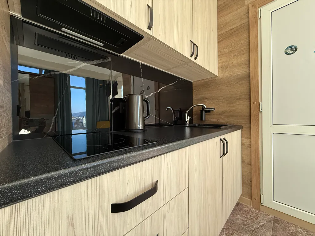 Квартира с шикарным видом на горы в центре Красной поляны