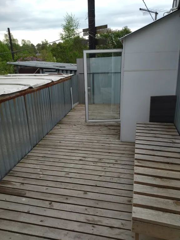 Домик с террасой в черте города