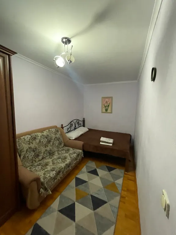 Уютная двухкомнатная квартира в центре Домбая