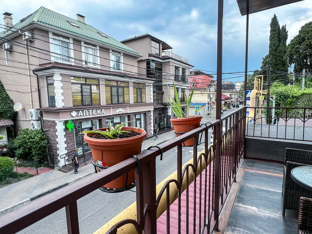 Семейный номер с кухней в центре