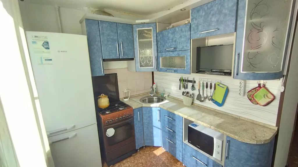 Четырехкомнатная квартира в тихом районе