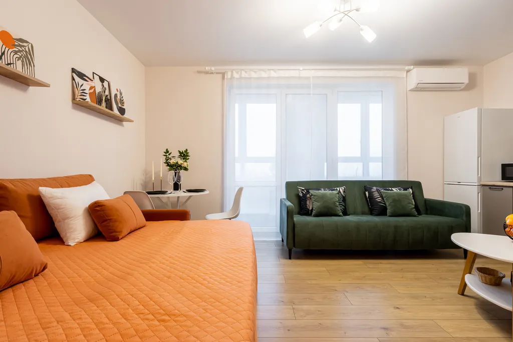 Студия Горизонты Нижнего Оранжево-изумрудный