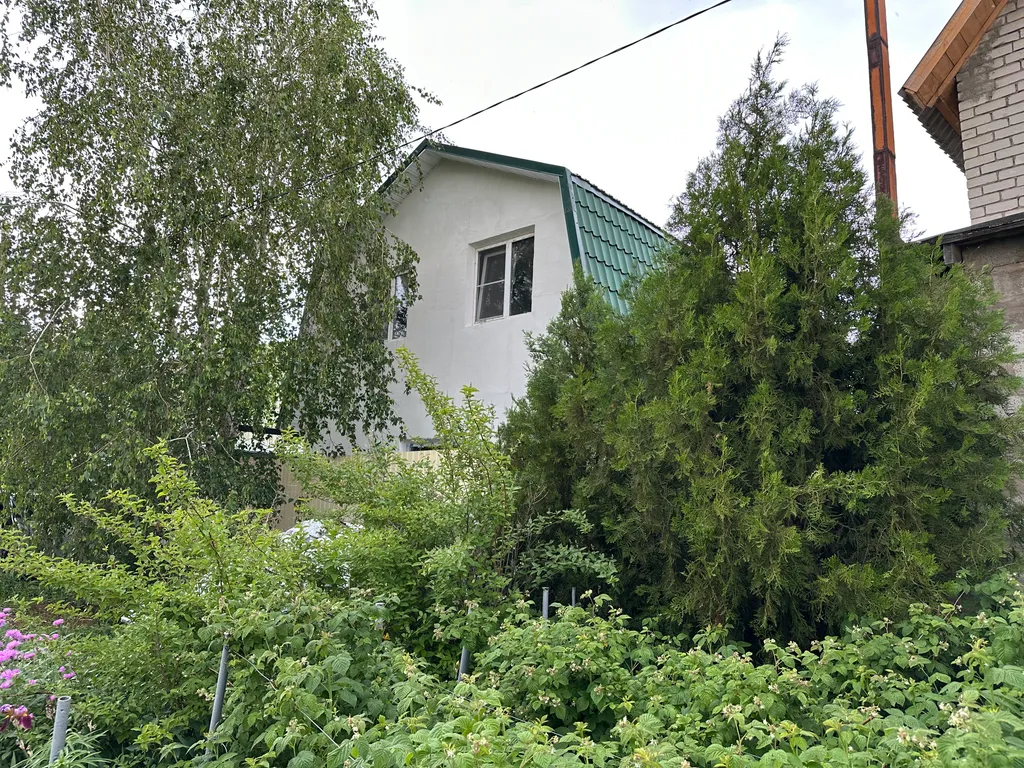 Дом на берегу залива реки Волга