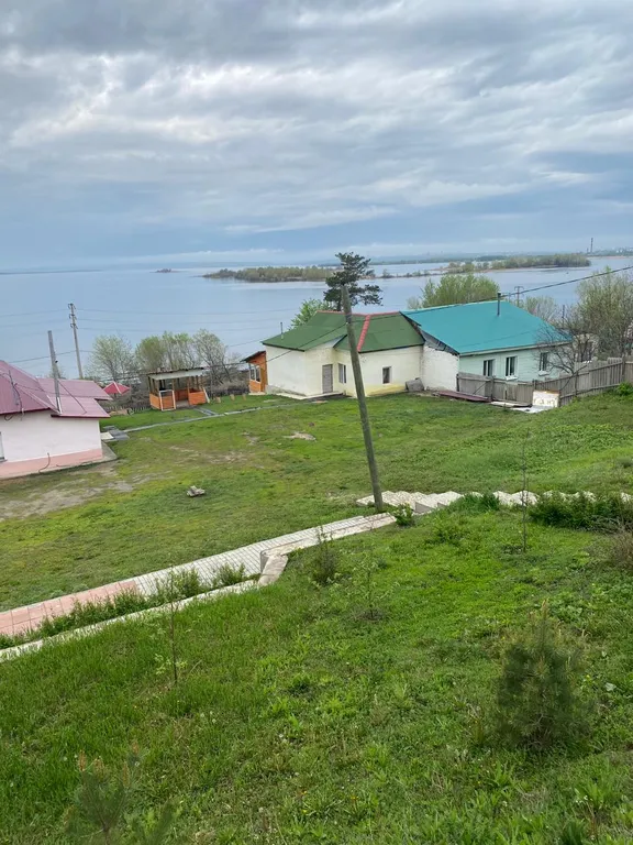 Дом с верандой и мангальной зоной на Волге