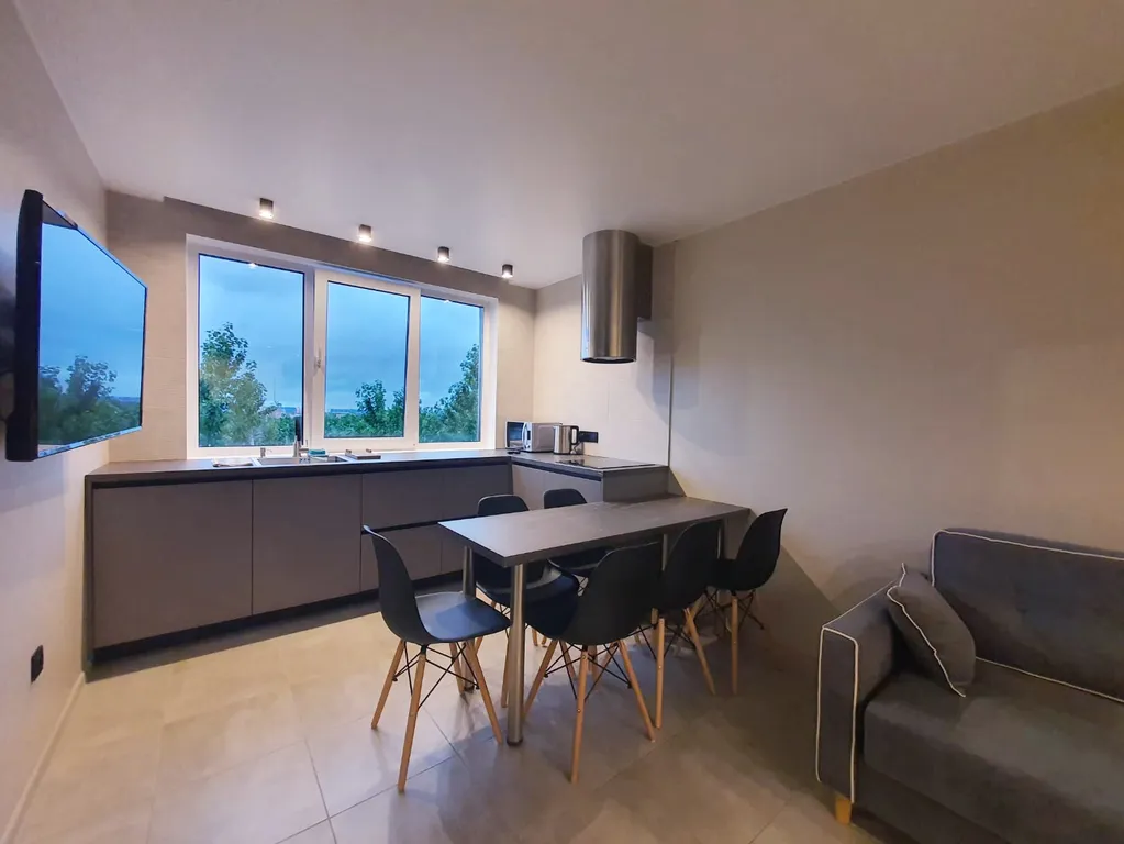 Новый апартамент с гостиной и тремя спальнями