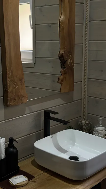 Уютный гостевой дом в Приэльбрусье с потрясающими видами на горы и лес