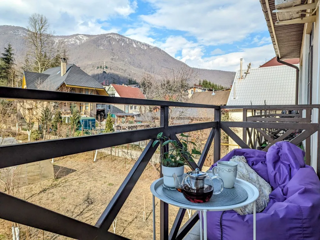 Двухуровневая квартира с балконом в центре