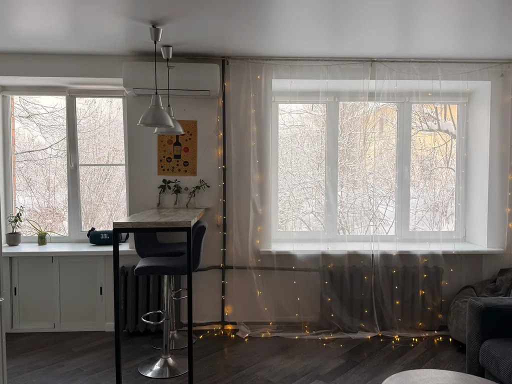 Уютная квартира-студия с отдельной спальней в самом центре города