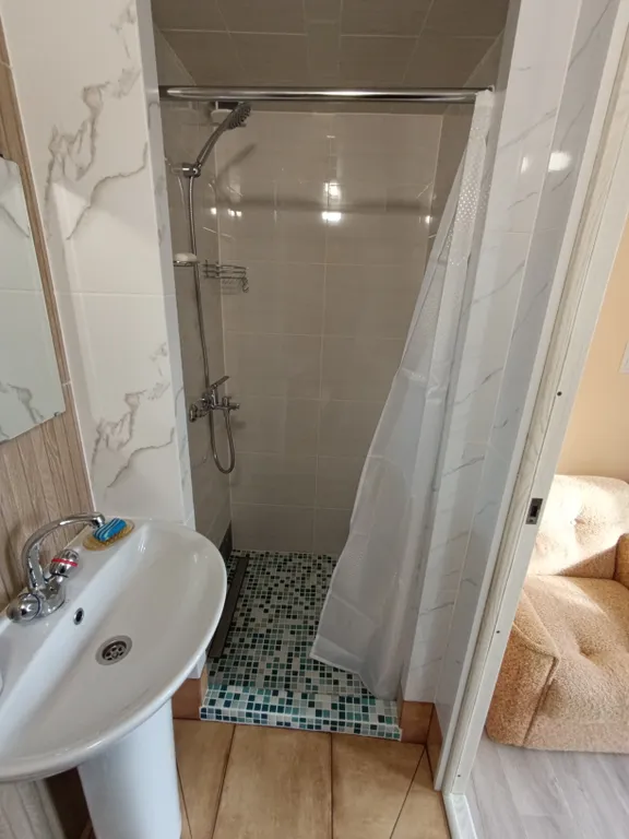 Двухуровневая квартира в центре города с высокими потолками