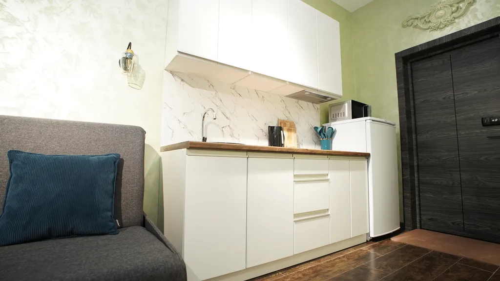 Просторная и уютная студия с балконом, идеальный вид на горы, центр