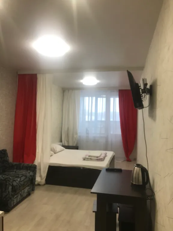 Уютная студия на высоком этаже