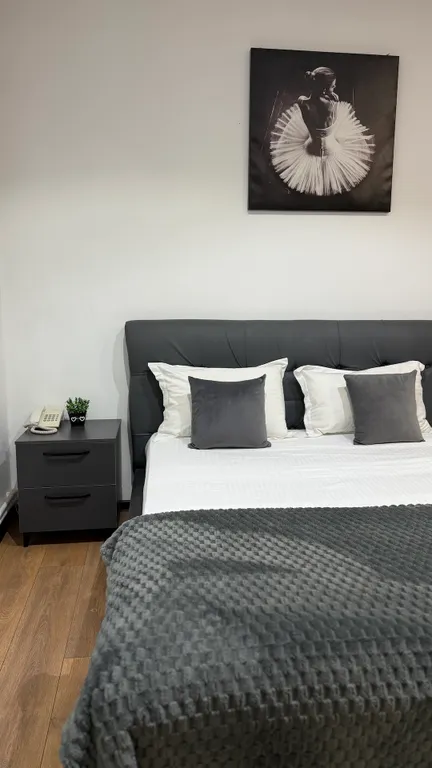 Апартаменты с террасой с видом на город и горы