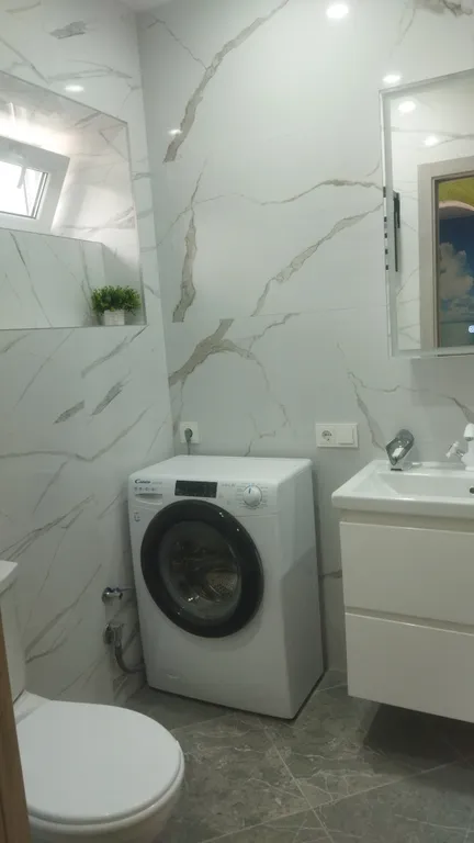 Дом с уютным двориком в тихом районе