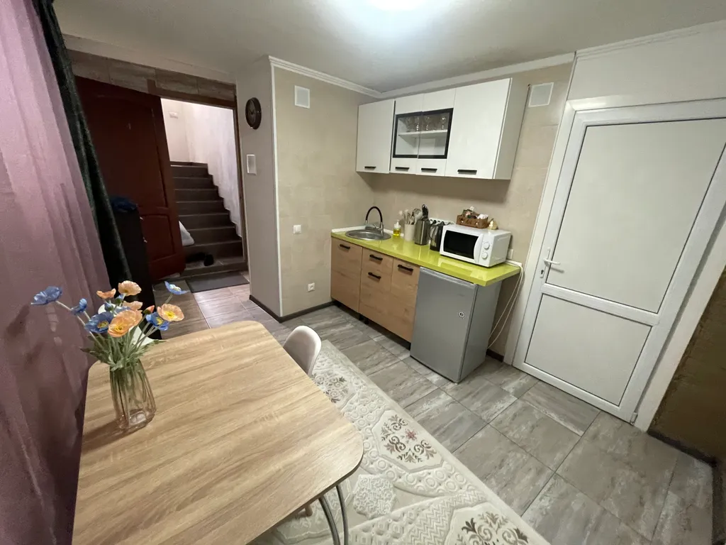 Комфортная 1-комнатная квартира в гостевом доме в самом центре