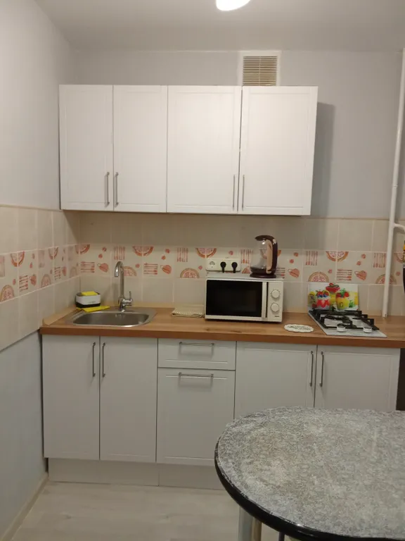 Светлая и уютная квартира в тихом спальном районе города