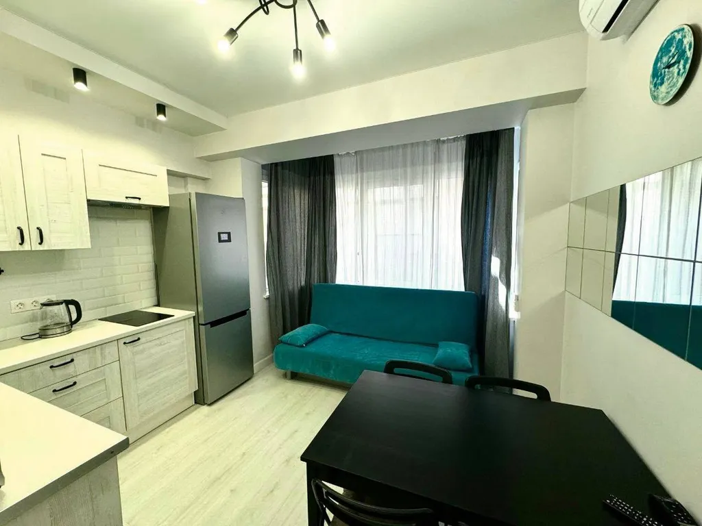 Уютная квартира с отдельной спальней в олимпийском парке